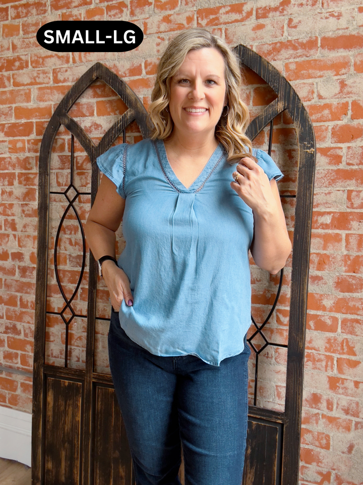 What It's About Chambray Button Back Blouse